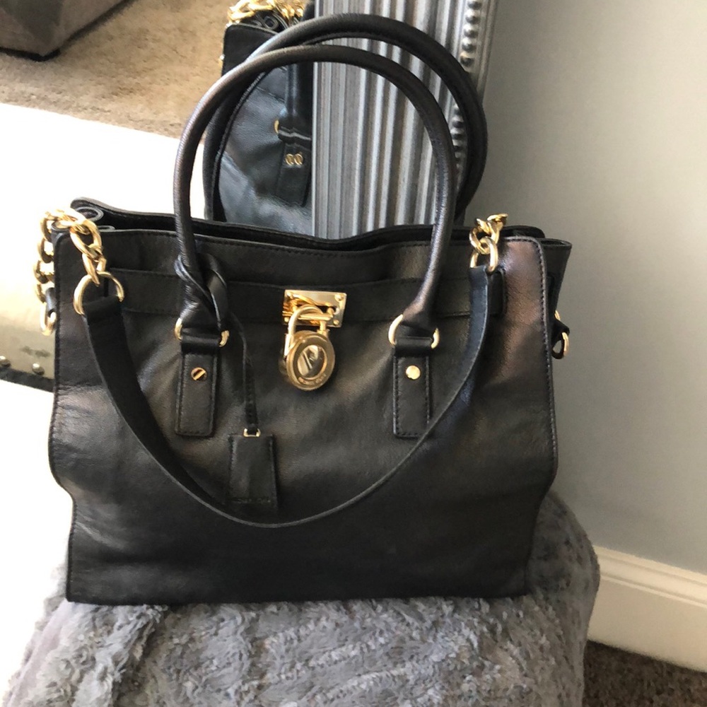 Black leather Michael Kors bag price as is for bag. Org. $495